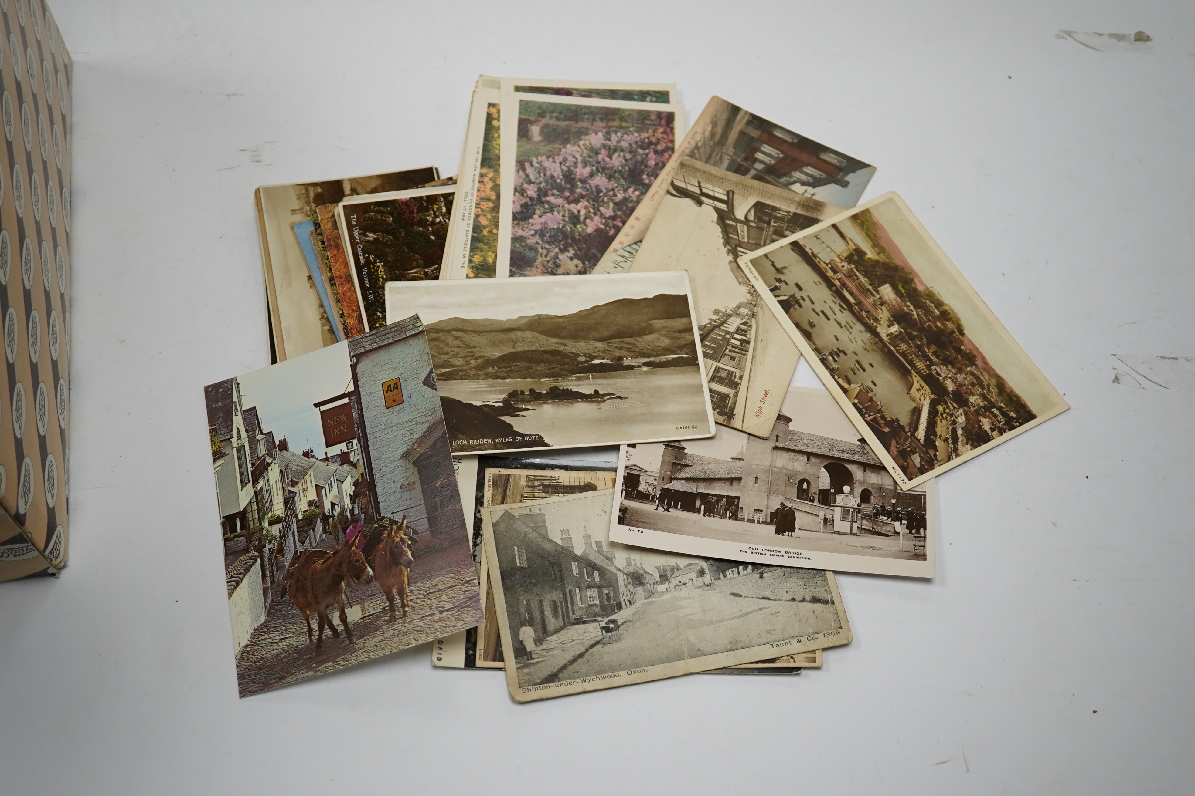 A quantity of loose early 20th century topographical postcards and ephemera. Condition - variable